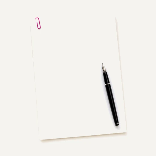 A blank sheet of paper with a black pen across it and a magenta paperclip at the corner.