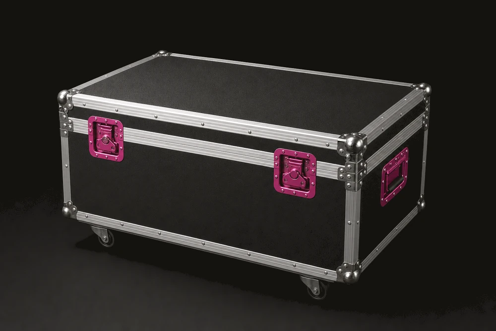 An unmarked black touring flight case with magenta latches.